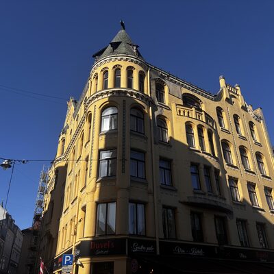 Both bronze cats on the roof of the Cat House, Riga, Latvia