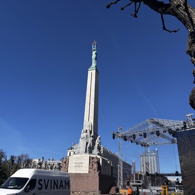 The Freedom Monument from the side with Bastejkalns park behind, Riga, Latvia