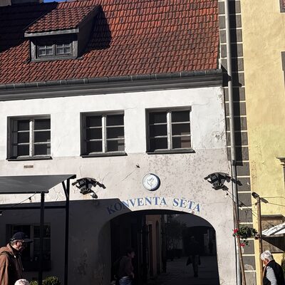 The Konventa Sēta arched doorway and sign on Kalēju iela, Riga, Latvia