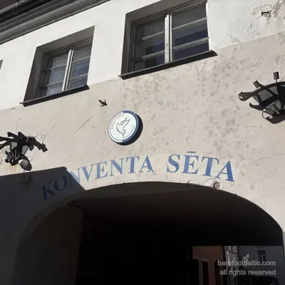 The Holy Spirit dove on the keystone above the Konventa Sēta entrance arch, Riga, Latvia