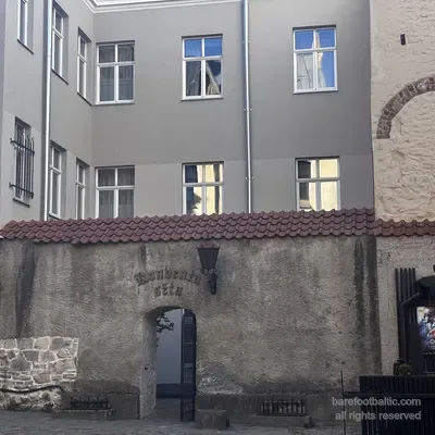 The inner courtyard of Konventa Sēta seen from the back passage, Riga, Latvia