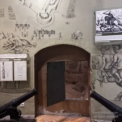 Medieval cannons and a plan of Riga's defences in the War Museum, Latvia