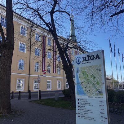 Pils laukums with Riga tourist information sign, near Riga Castle, Latvia