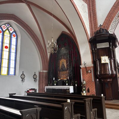 Inside St James's Cathedral: Gothic vaulting, stained glass, Catholic high altar, Riga, Latvia