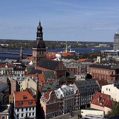 The view from St Peter's tower over the Old Town rooftops, with Riga Cathedral in the middle distance, Latvia