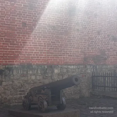 Medieval city wall with cannon, near the Swedish Gate, Riga, Latvia