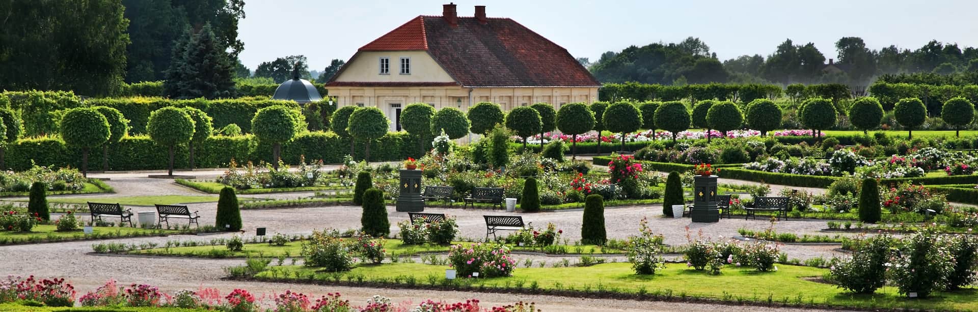 Rundāle Palace formal rose garden with manicured topiary