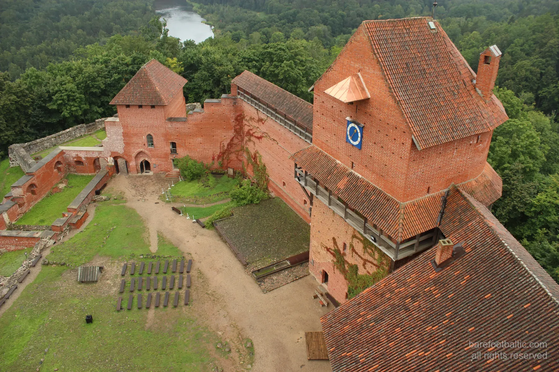 Aerial view of red-brick Turaida Castle above the Gauja valley, Sigulda, Latvia