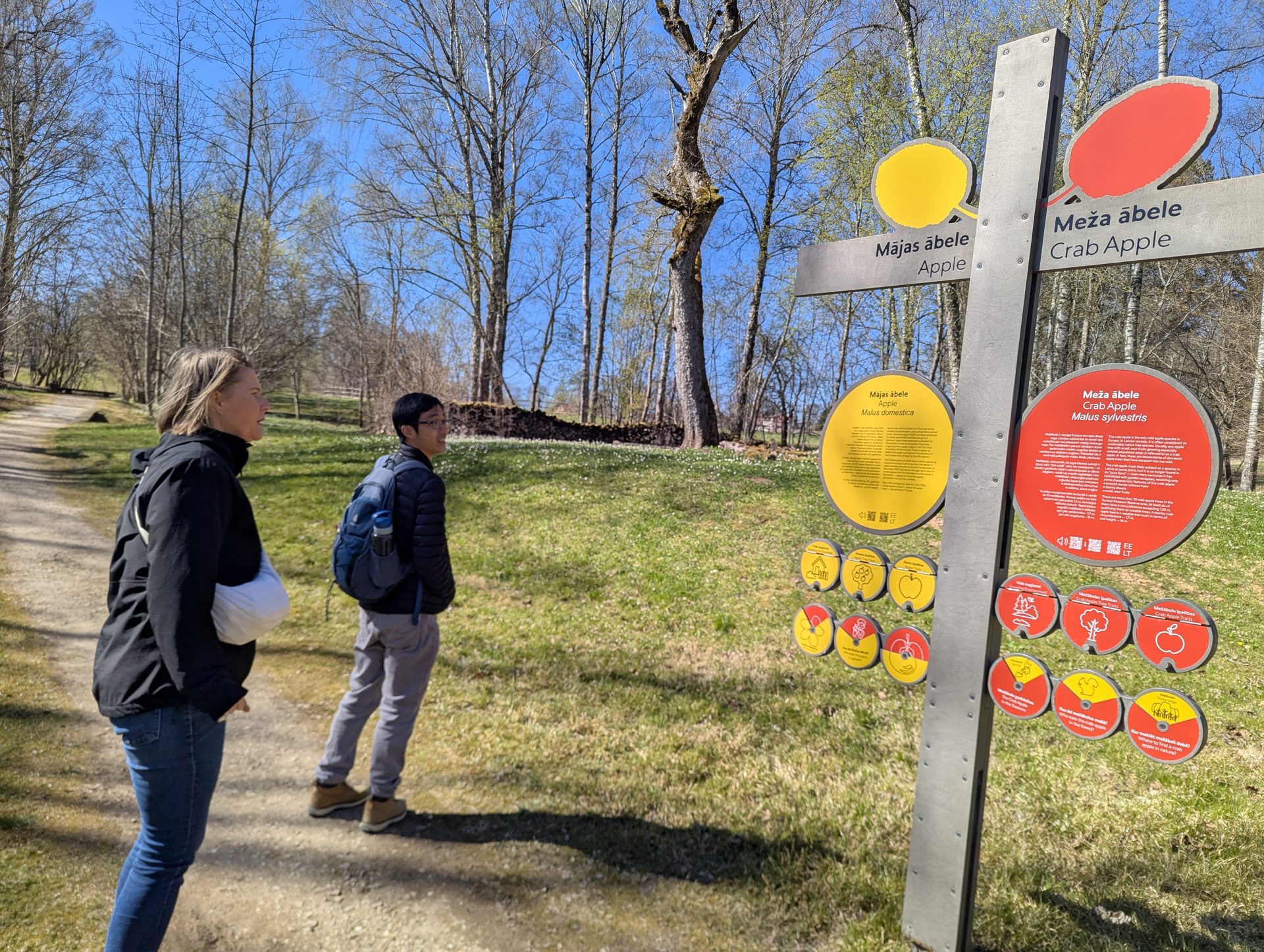 Guests at an apple-tree exhibit on the Turaida Folk Songs Hill